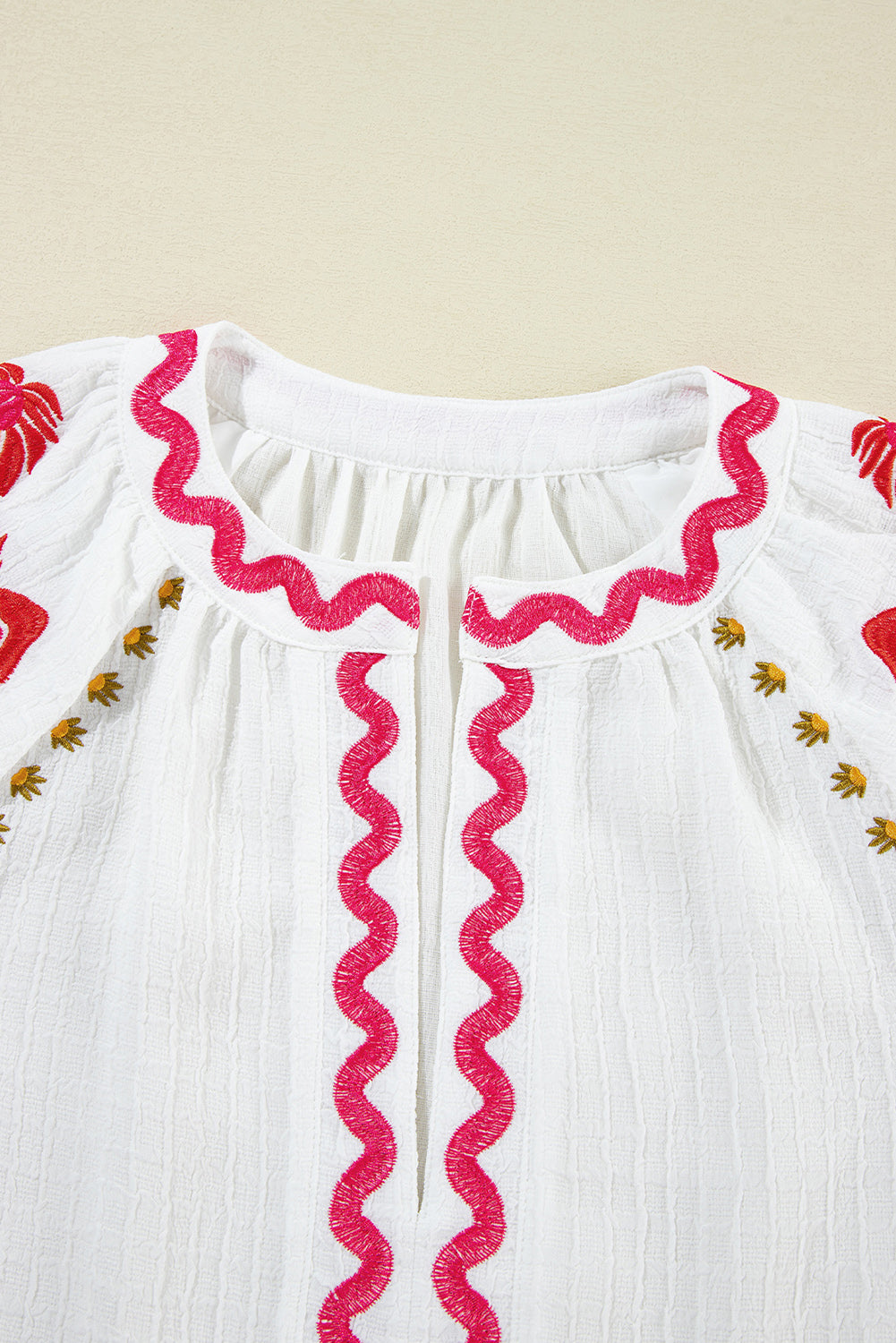 Embroidered Notched Half Sleeve Blouse